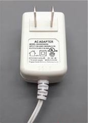 One-piece plug adapter.
